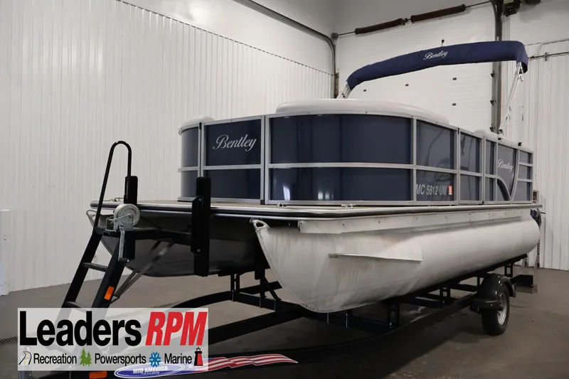 The Image of 2020 Bentley Pontoons 180 CRUISE pontoon boat on trailer in indoor showroom. - 0