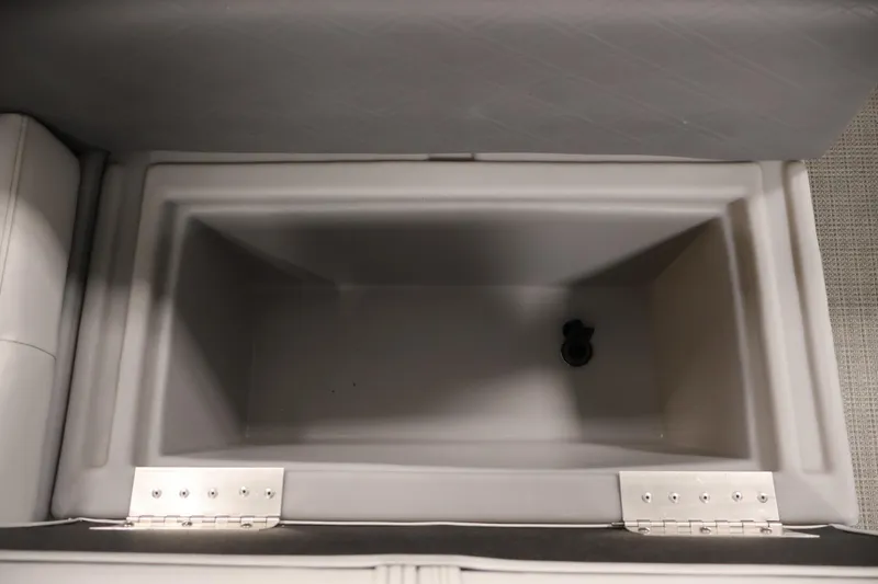 Slide: The Image of Storage compartment in 2020 Bentley Pontoons 180 CRUISE boat, featuring a spacious interior. - 26