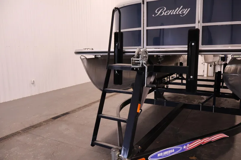 Slide: The Image of 2020 Bentley Pontoons 180 CRUISE on trailer in indoor storage facility. - 34