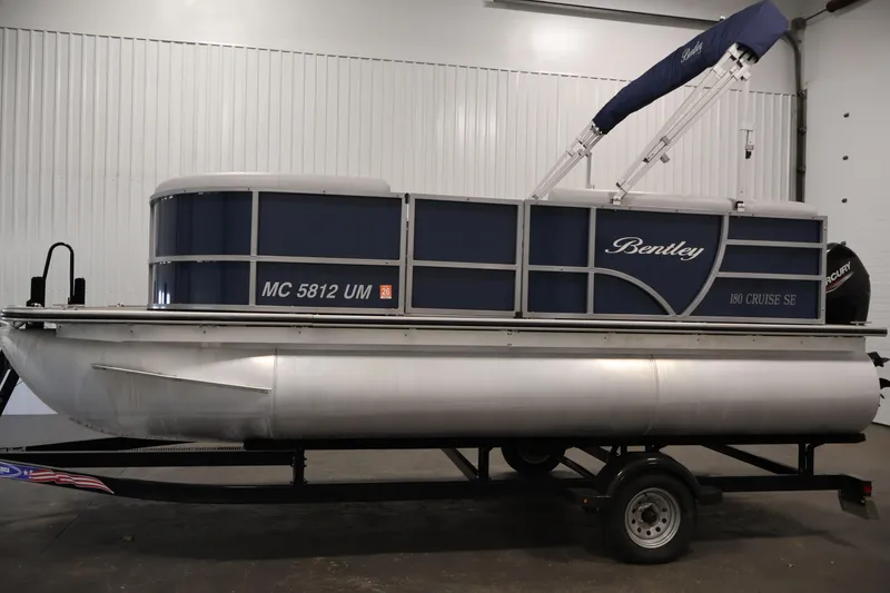 Slide: The Image of 2020 Bentley Pontoons 180 CRUISE on trailer in indoor setting. - 7
