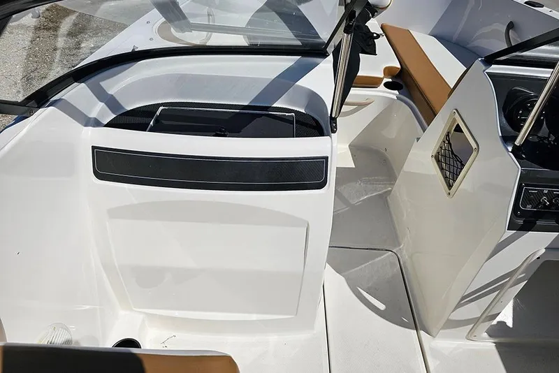 Slide: The Image of 2021 Bayliner VR4 Bowrider OB interior with sleek design and modern dashboard. - 13
