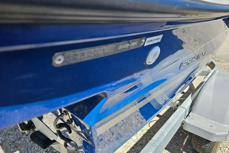 Slide: The Image of 2021 Bayliner VR4 Bowrider OB in blue, close-up view on trailer. - 22