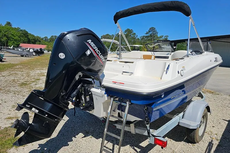 Slide: The Image of 2021 Bayliner VR4 Bowrider OB with Mercury outboard engine on trailer. - 3