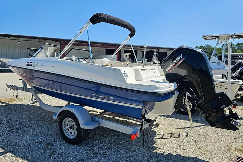 Slide: The Image of 2021 Bayliner VR4 Bowrider OB with Mercury outboard engine on trailer. - 7