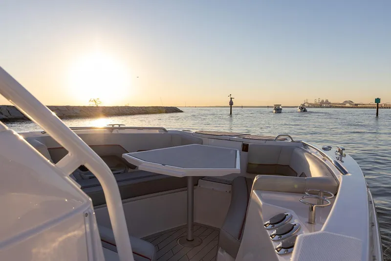Slide: The Image of Manufacturer Provided Image: Solara S-250 CW boat at sunset on calm waters, 2025 model. - 10