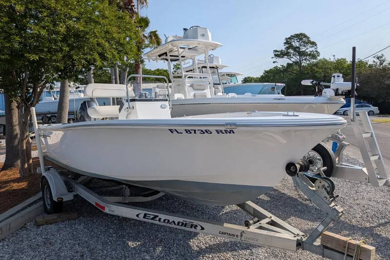 Slide: The Image of 2016 Sportsman Island Reef 17 Center Console boat on trailer, parked outdoors. - 3