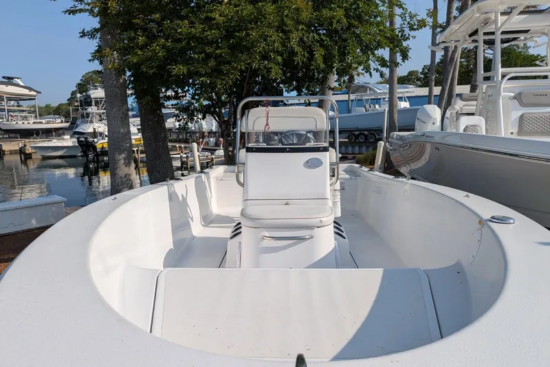 Slide: The Image of 2016 Sportsman Island Reef 17 Center Console boat docked at marina. - 4