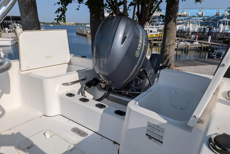 Slide: The Image of 2016 Sportsman Island Reef 17 Center Console boat with Yamaha outboard motor at marina. - 9