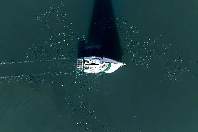 Slide: The Image of Aerial view of a Beneteau Oceanis Clipper 343 yacht on calm waters. - 10