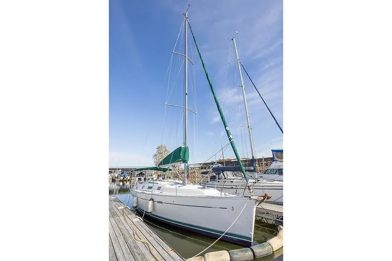 Slide: The Image of 2008 Beneteau Oceanis Clipper 343 sailboat docked at marina. - 11