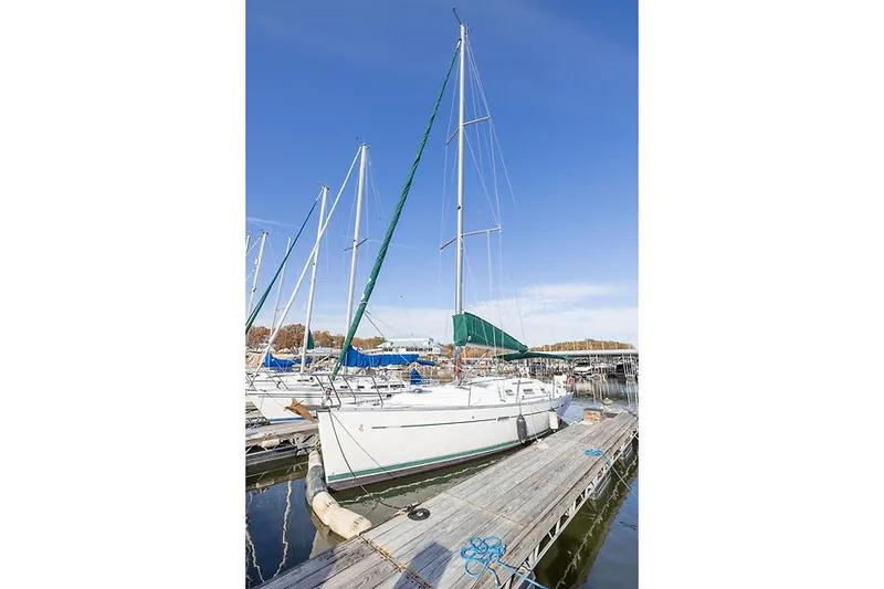Slide: The Image of 2008 Beneteau Oceanis Clipper 343 sailboat docked at marina. - 13