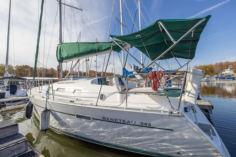Slide: The Image of 2008 Beneteau Oceanis Clipper 343 sailboat docked in marina. - 15