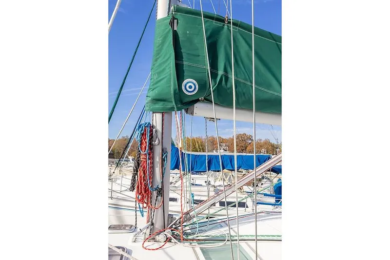 Slide: The Image of Beneteau Oceanis Clipper 343 sailboat, 2008 model, with green sail cover. - 18