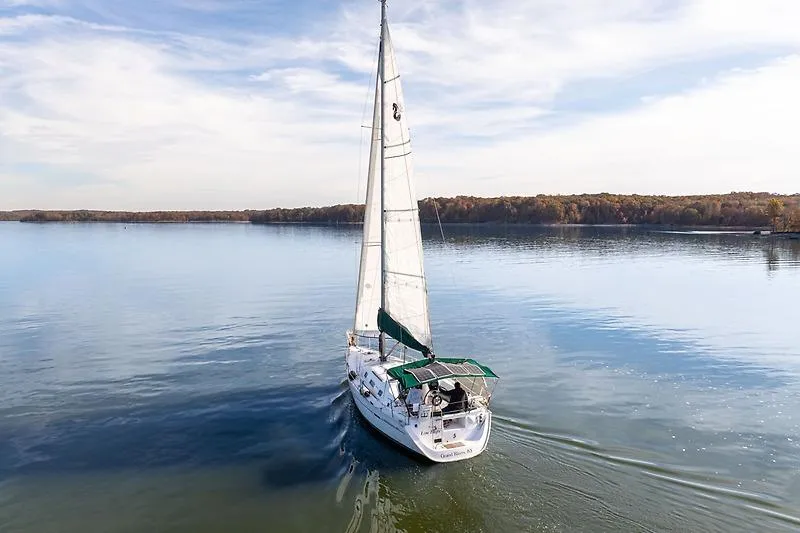 Slide: The Image of Beneteau Oceanis Clipper 343 sailboat on calm water, year 2008. - 9