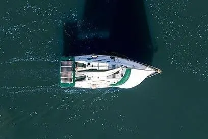 Slide: The Image of Aerial view of a Beneteau Oceanis Clipper 343 yacht on calm waters. - 10