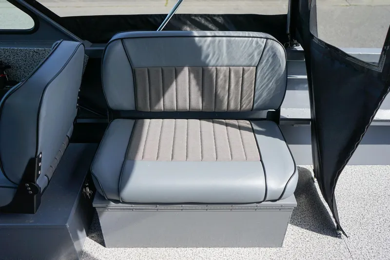 Slide: The Image of 2026 Alumaweld Talon 18 boat seat, featuring gray and black upholstery. - 8