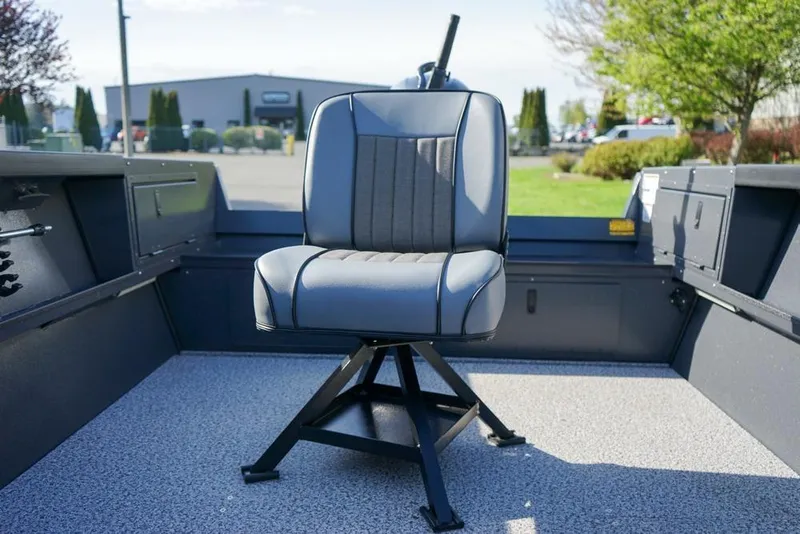Slide: The Image of 2026 Alumaweld Adventurer 20 boat interior with a swivel seat. - 11