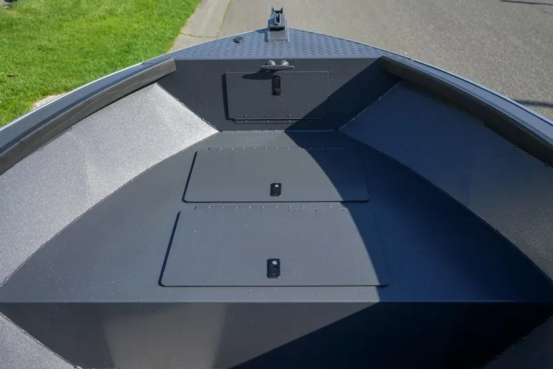 Slide: The Image of 2026 Alumaweld Adventurer 20 boat interior, featuring spacious storage compartments and sleek design. - 15