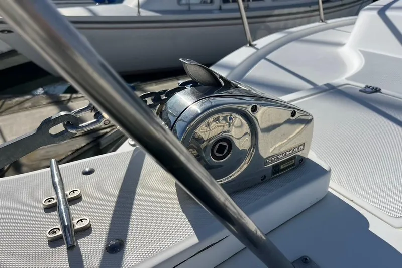 Slide: The Image of Close-up of a 1992 Rampage 28 Sportsman boat's anchor winch on deck. - 3