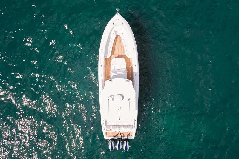 Slide: The Image of Aerial view of 2024 Midnight Express yacht on clear blue water. - 4