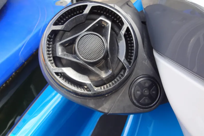 Slide: The Image of Close-up of 2021 Seadoo GTI 170 SE speaker and control panel on blue watercraft. - 20
