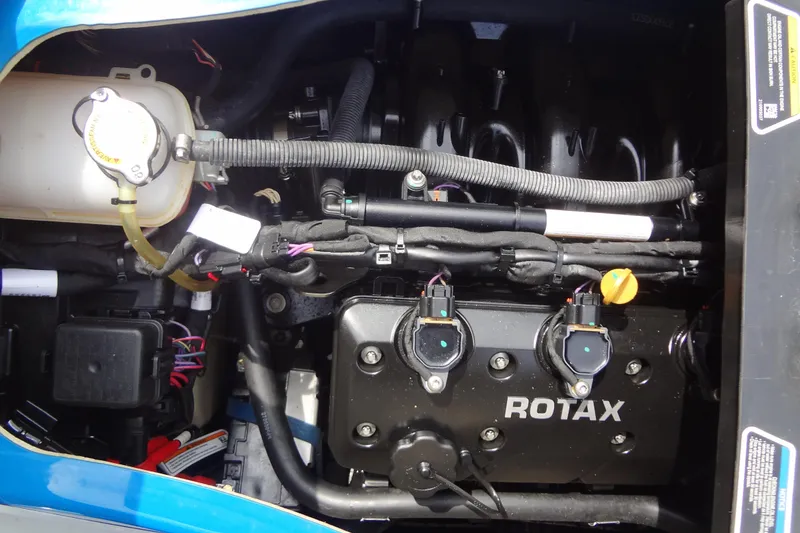 Slide: The Image of Engine compartment of a 2021 Seadoo GTI 170 SE with Rotax engine components. - 22