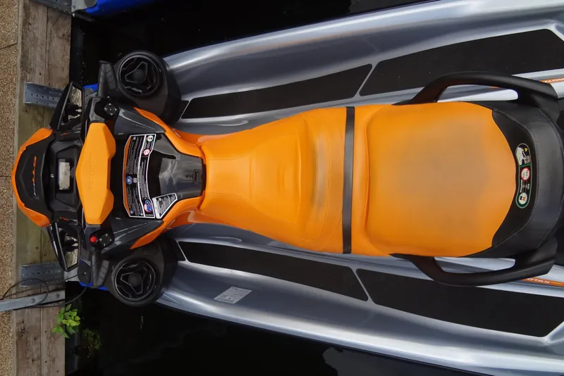 Slide: The Image of 2021 Seadoo GTI 170 SE jet ski with orange seat, top view. - 8