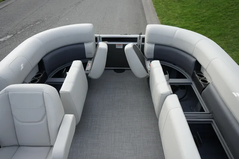 Slide: The Image of 2025 Starcraft LX 16 R boat interior with gray seating and cup holders. - 4