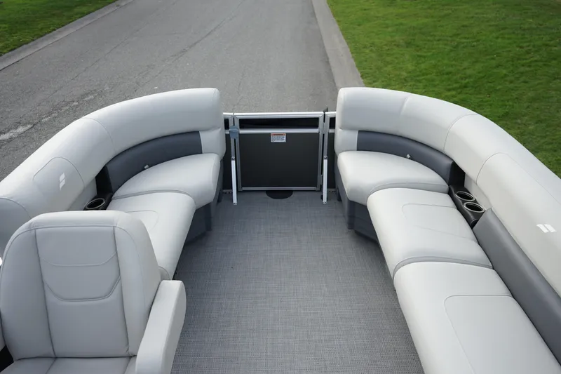 Slide: The Image of Luxurious seating on 2025 Starcraft LX 16 R pontoon boat, featuring sleek gray upholstery. - 5