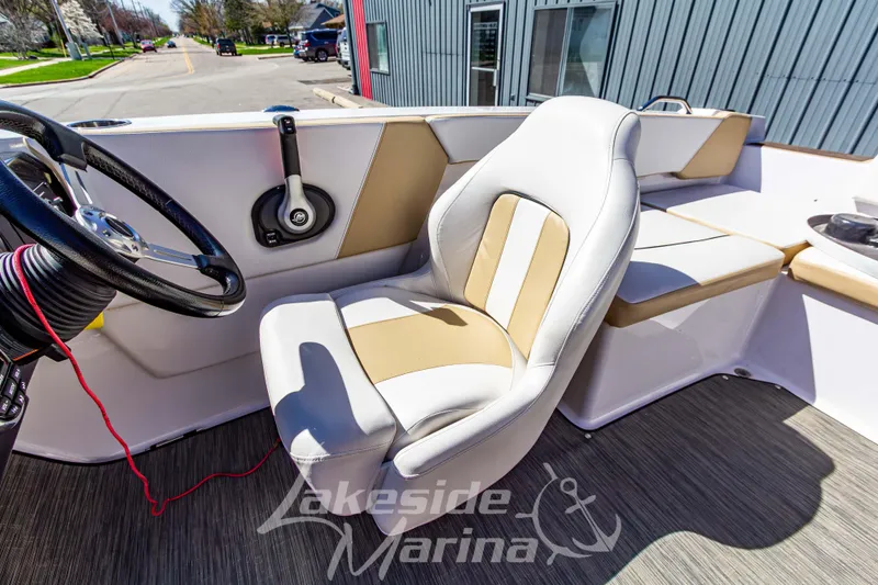 Slide: The Image of 2019 Glastron GTD 180 boat interior with steering wheel and seating at Lakeside Marina. - 21