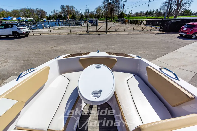 Slide: The Image of 2019 Glastron GTD 180 boat interior with seating and table at Lakeside Marina. - 27