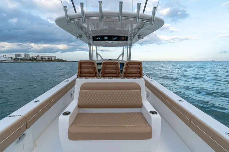 Slide: The Image of 2026 Valhalla Boatworks V-37 on open water, featuring luxurious seating and sleek design. - 6