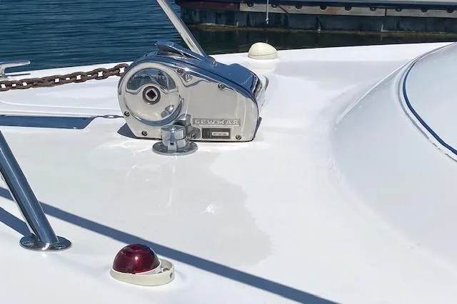 Slide: The Image of Bow of 2001 Monterey 302 Cruiser with Lewmar windlass and navigation light. - 11