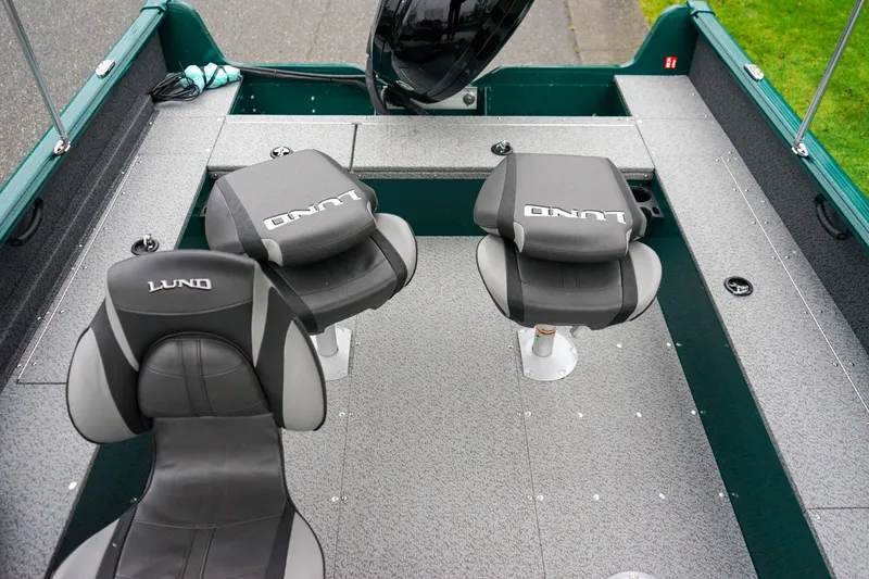 Slide: The Image of 2026 Lund 1800 Explorer Sport boat interior with two swivel seats. - 6