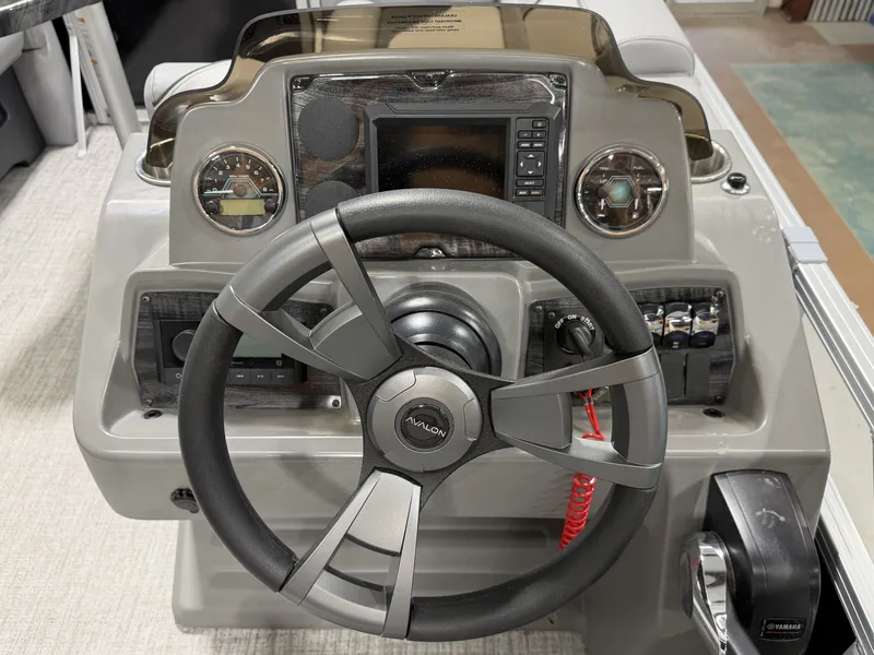Slide: The Image of Avalon VNT VRB21T 2026 steering console with wheel and instruments. - 6