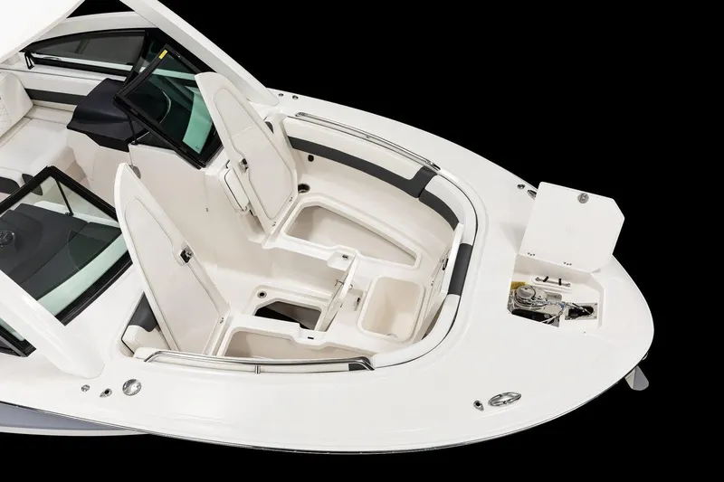 Slide: The Image of Manufacturer Provided Image: 2026 Robalo R277 Dual Console boat interior with seating and storage compartments. - 4