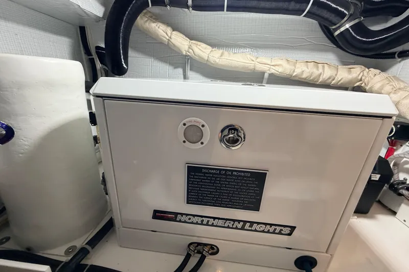 Slide: The Image of Engine room of 2022 American Tug 365 featuring Northern Lights generator. - 44