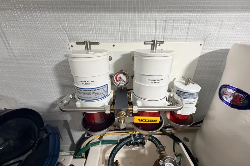 Slide: The Image of Engine room of 2022 American Tug 365 with Racor fuel filters and separators. - 45