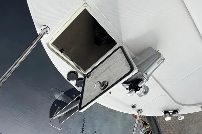 Slide: The Image of Open hatch on 2022 American Tug 365 boat deck with anchor and winch. - 71