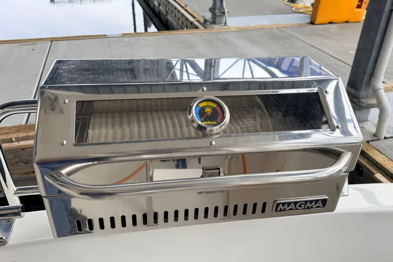 Slide: The Image of Stainless steel Magma grill on 2022 American Tug 365 boat docked at marina. - 79