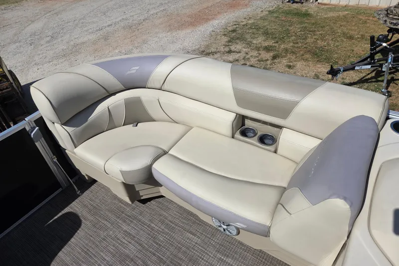 Slide: The Image of Luxurious seating on 2019 Starcraft EX 20 CF boat with cup holders and plush upholstery. - 10