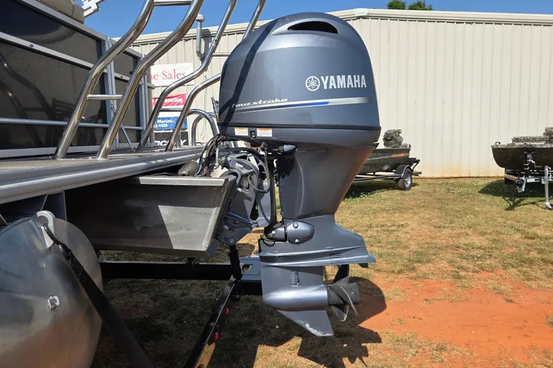 Slide: The Image of 2019 Starcraft EX 20 CF boat with Yamaha four-stroke outboard motor displayed outdoors. - 7