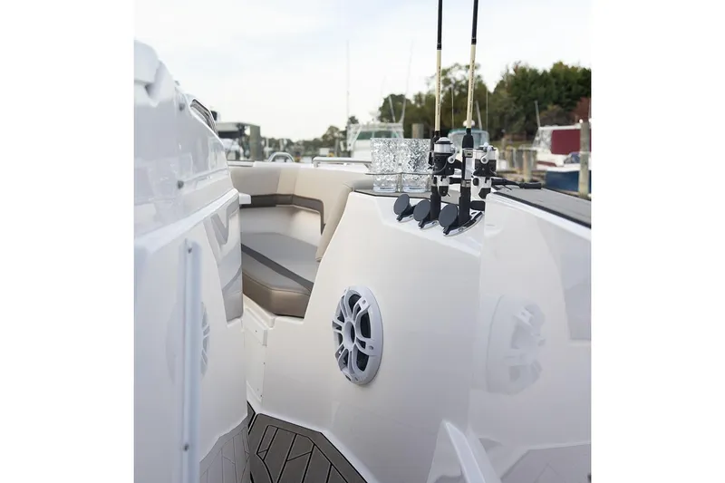 Slide: The Image of Manufacturer Provided Image: 2025 Solara S-310 CW boat interior with seating and fishing rod holders. - 20