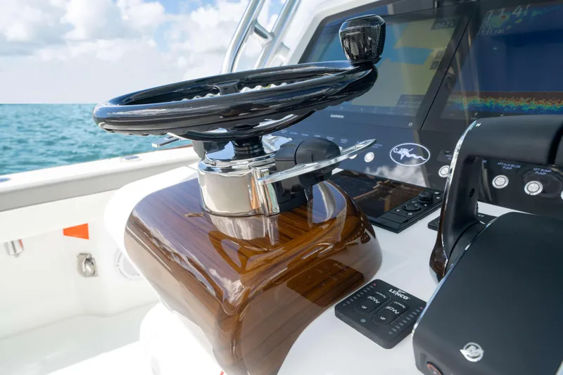 Slide: The Image of Steering console of 2026 Valhalla Boatworks V-29 Hybrid with advanced navigation displays. - 4