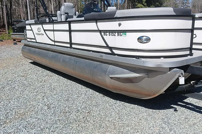 The Image of 2023 Veranda Relax VR22RC pontoon boat on gravel surface. - 0