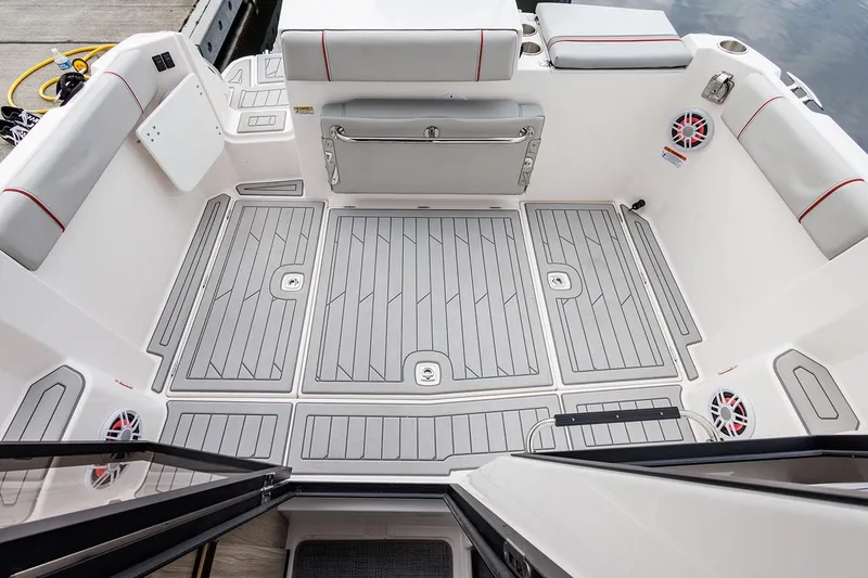 Slide: The Image of Manufacturer Provided Image: 2025 Solara S-250 Coupe boat interior with sleek, modern design and spacious seating area. - 8