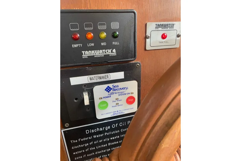 Slide: The Image of Control panel of a 1987 Albin 36 Trawler with Tankwatch system and watermaker. - 11