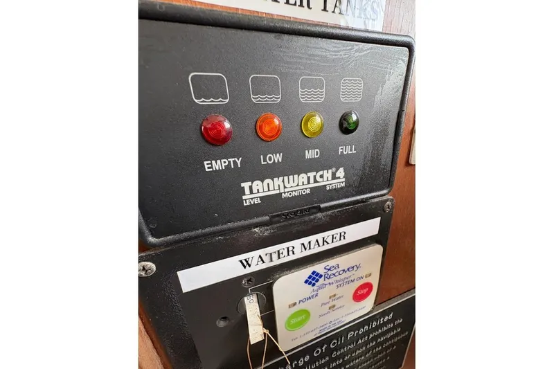 Slide: The Image of Tank level monitor system on 1987 Albin 36 Trawler, showing water maker controls. - 15