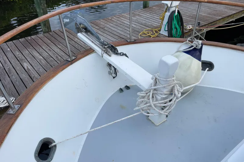 Slide: The Image of Bow of 1987 Albin 36 Trawler with anchor and dock lines. - 28