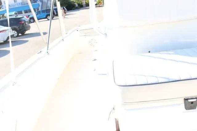 Slide: The Image of Interior view of a 2017 Mako 21 LTS boat in a parking lot. - 12